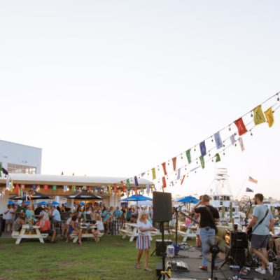 a group of people standing in front of a crowd