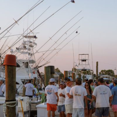 a group of people standing in front of a crowd