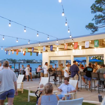 a group of people standing in front of a crowd