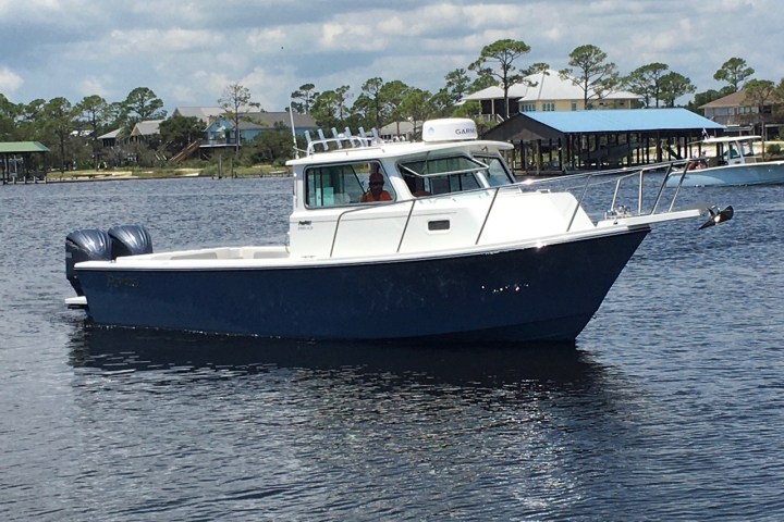 a small boat in a large body of water