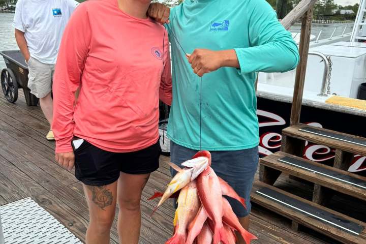 a group of people standing next to a person