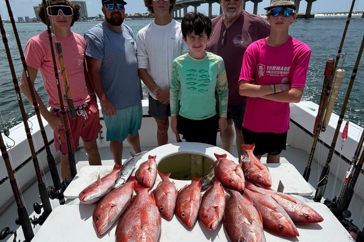 a group of people riding on the back of a crab
