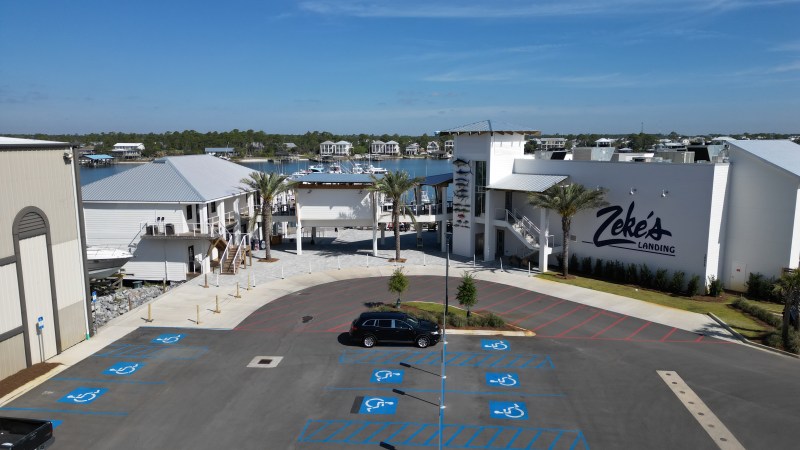 a road with a building in the background