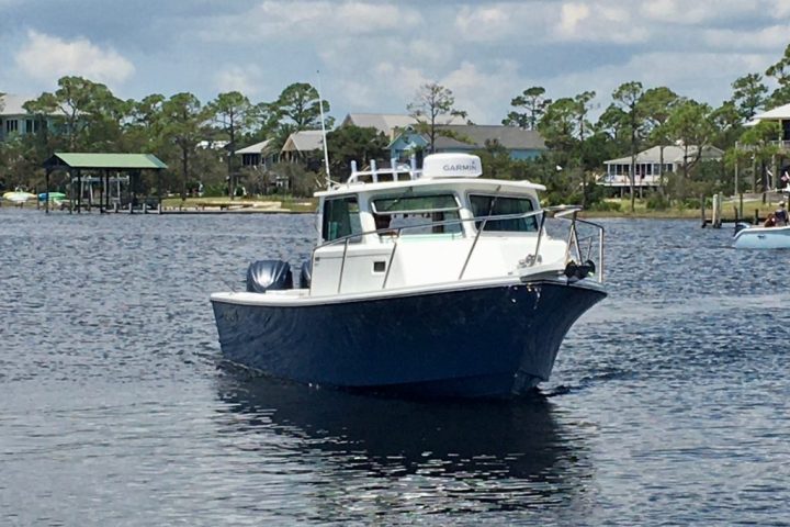 a small boat in a body of water