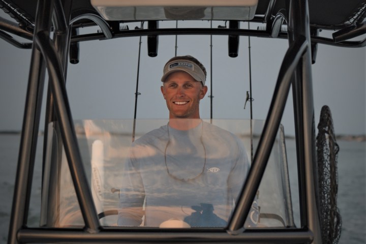 a person sitting on a boat