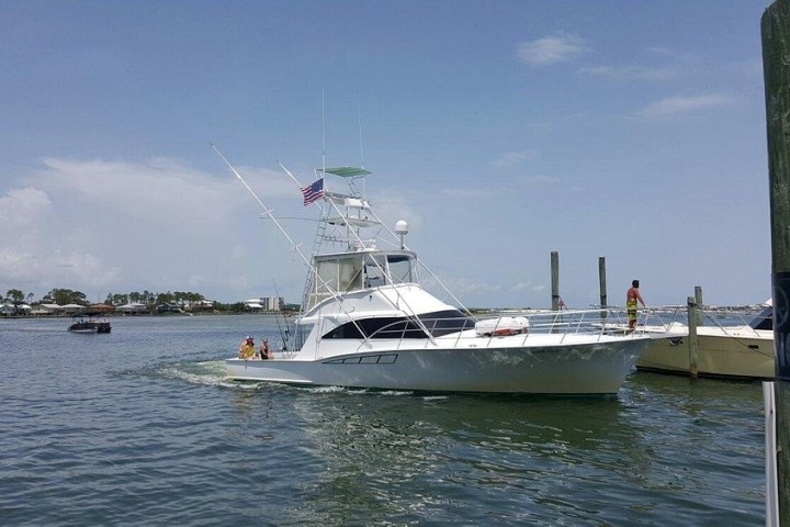 a small boat in a large body of water