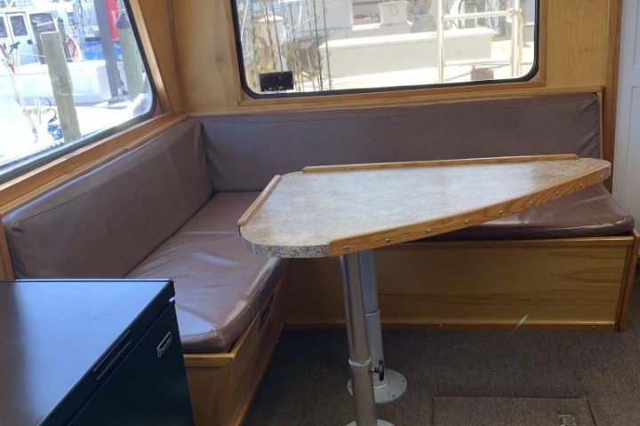 a stove top oven sitting next to a window