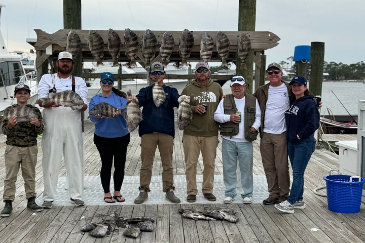 a group of people standing in front of a building