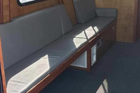 a bedroom with a large window