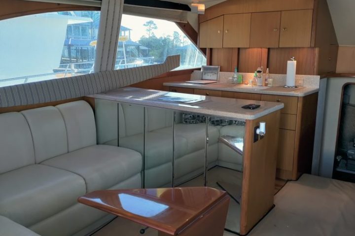 a room filled with furniture and a large window