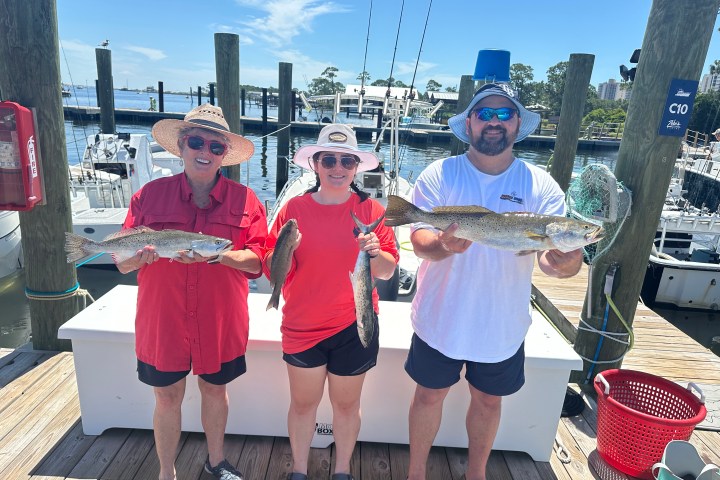 a group of people posing for the camera