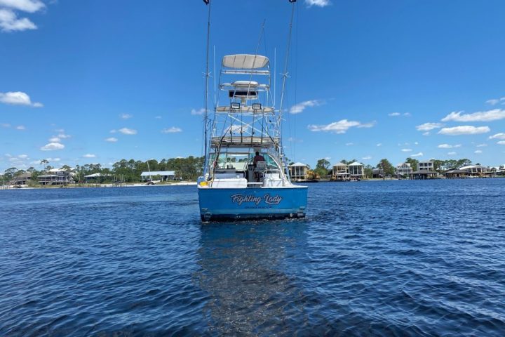 a small boat in a large body of water