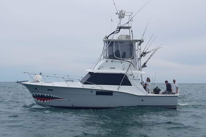 a small boat in a large body of water