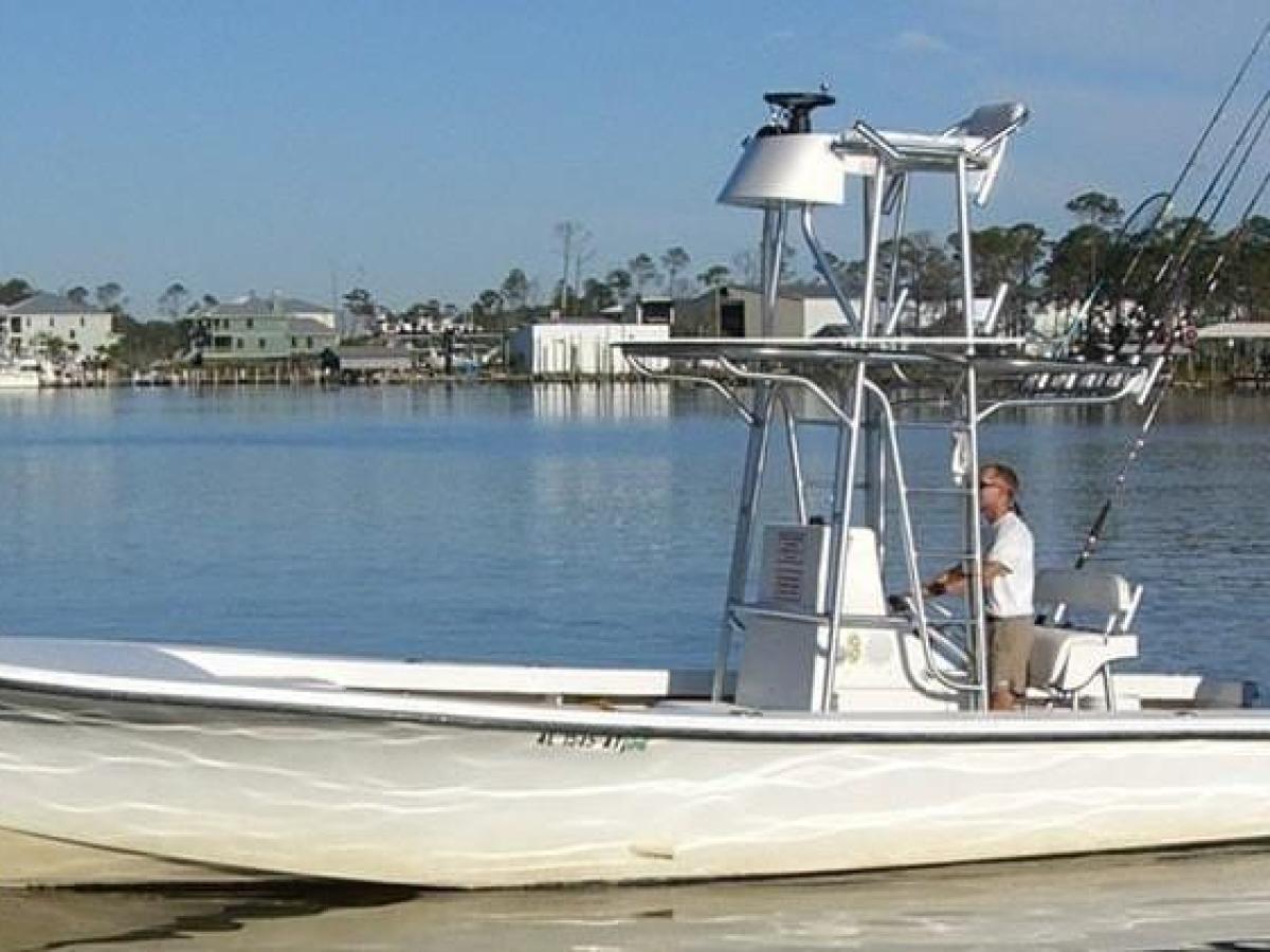 a small boat in a body of water