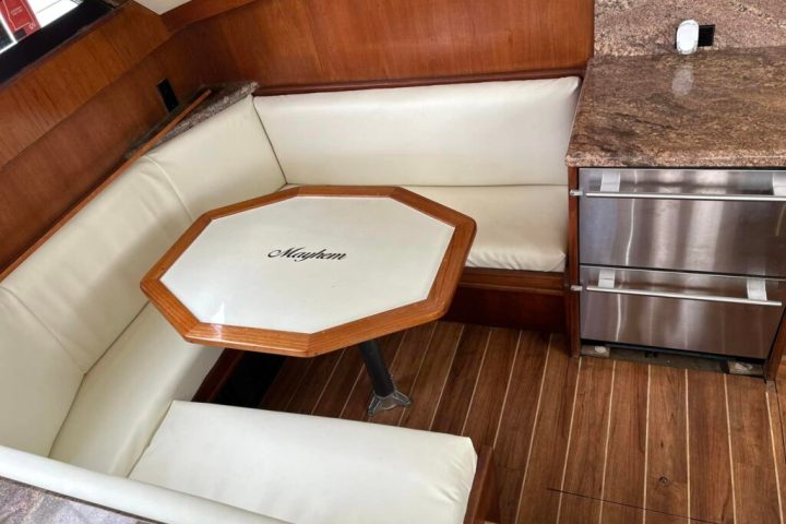 a chair sitting in front of a wooden table