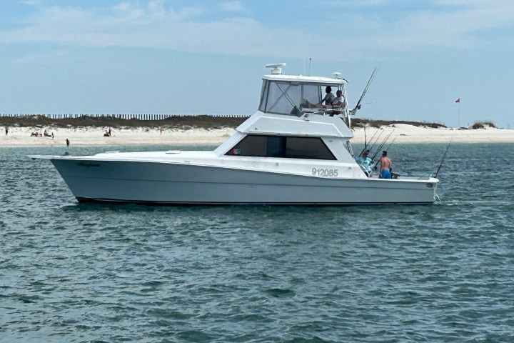 a small boat in a large body of water