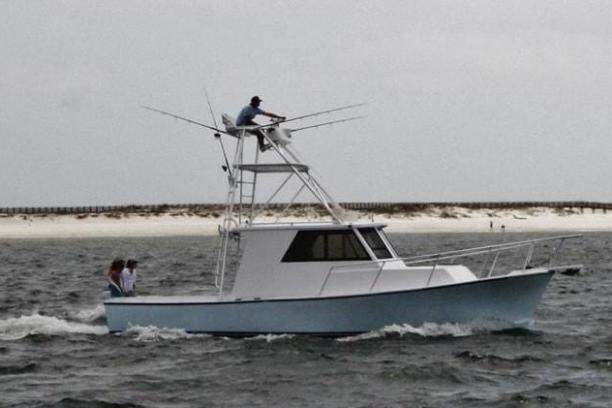 a small boat in a body of water