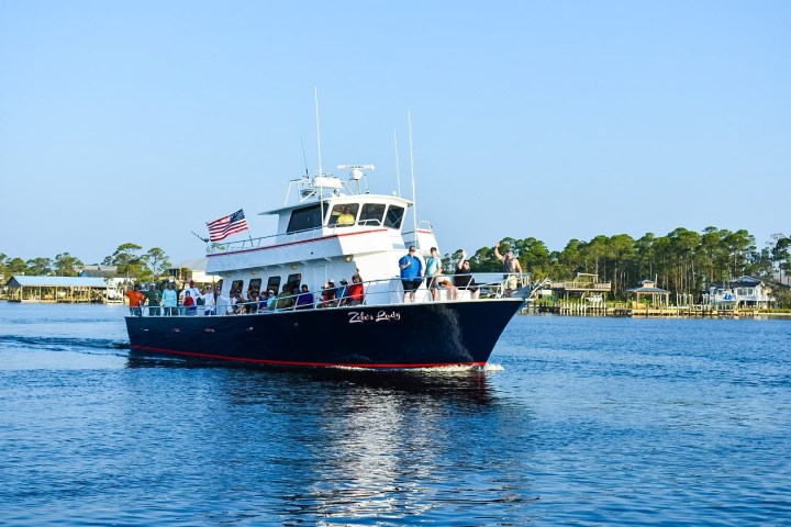 a small boat in a large body of water