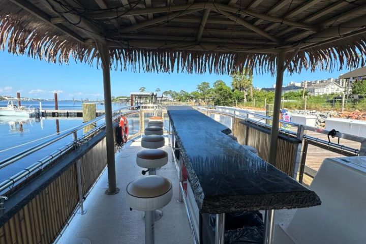 a group of people sitting at a train station