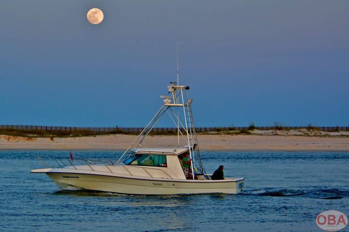 a small boat in a body of water